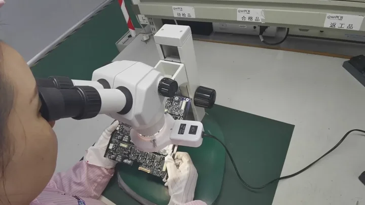 Microscope inspection: close visual review of a populated board. Shijiazhuang PCBA factory